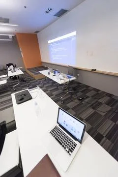 Empty it classroom empty it classroom with program code on projector scree... Photos