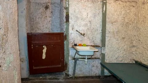 Empty Jail Cells. Prison Interior. Metal Door Protect Prisoner From Inside to 库存照片