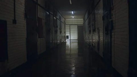 An empty jail corridor during the day Stock Footage 283087756