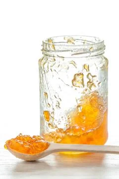 Empty jar with peach orange jam Stock Photos