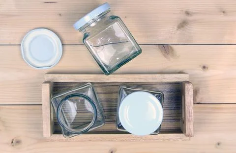 Empty jar on wood table background Stock Photos