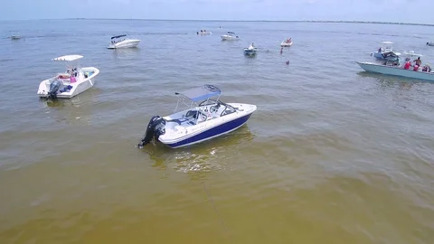 Empty Jet Ski and kayaks in the ocean Stock Footage 103982544