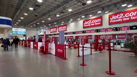 Empty Jet2.com Check-In Desks at Birmingham Airport Terminal During Crisis Stock Footage 338365468