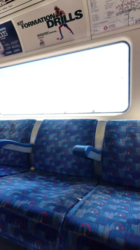 Empty jubilee line train interior, london public transport commute. vertical Stock Footage 337873419