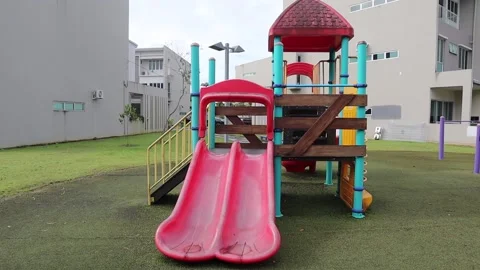An empty kid slide in the garden Stock Footage 170353549