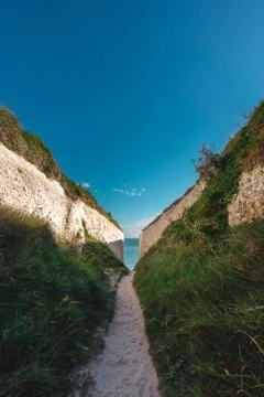 Empty Kingsgate Beach, walking through the chalk stacks clifs at Botany Bay i Stock Photos