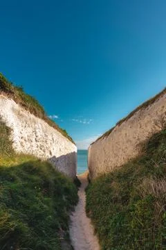 Empty Kingsgate Beach, walking through the chalk stacks clifs at Botany Bay i Stock Photos