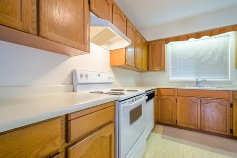 An empty kitchen in a house. Stock Photos