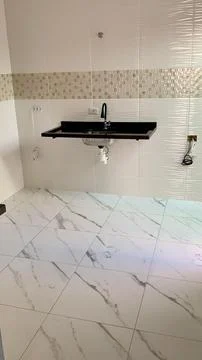 Empty kitchen with sink Stock Photos