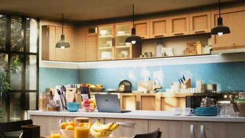 Empty kitchen table with croissants and homemade food for breakfast Foto stock