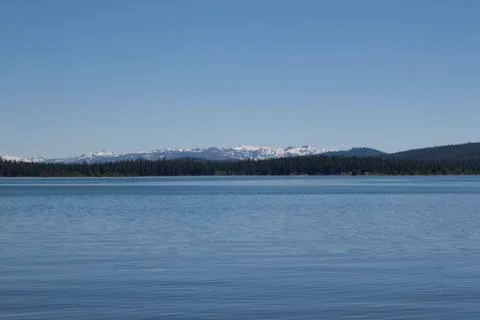 Empty lake with calm water surface Stock Photos