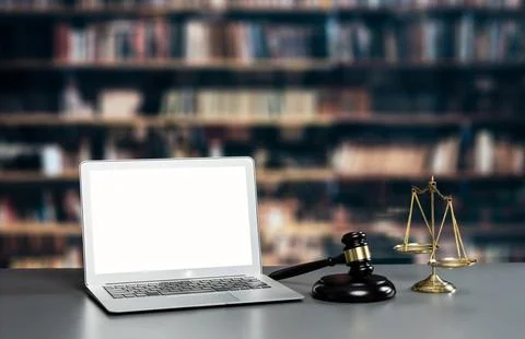 Empty laptop computer screen for astute design mockup on a table in library Stock Photos