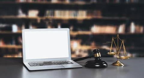 Empty laptop computer screen for astute design mockup on a table in library Stock Photos
