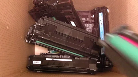 Empty Laser printer Toner Cartridges being put in a recycling bin Stock Footage 41890969