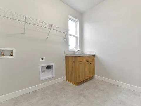 Empty laundry room Stock Photos