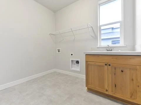 Empty laundry room Stock Photos