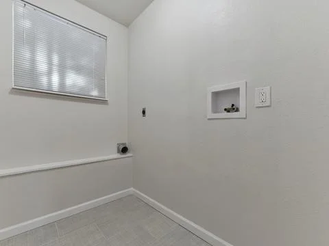 Empty laundry room Stock Photos
