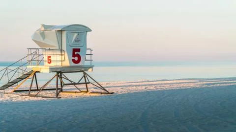 Empty Lifeguard Station on a beautiful tranquil white sand beach in Florida. Stock Photos