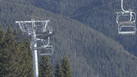 Empty lift seats moving Stock Footage 222362222