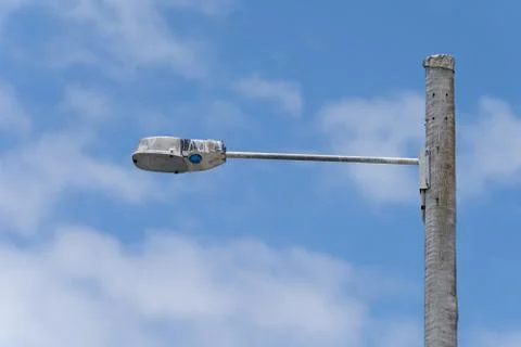 Empty light pole usually occupied Stock Photos