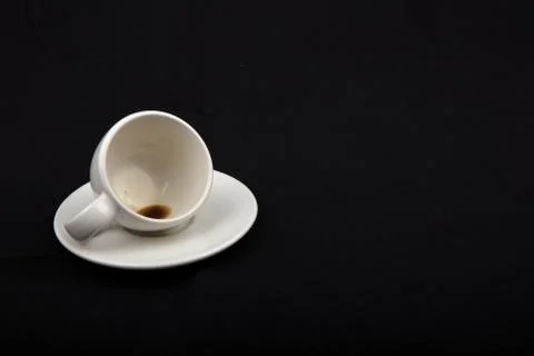 Empty little cup of coffee on the side Stock Photos