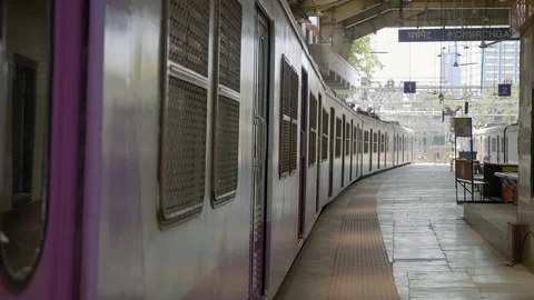 Empty local train is parked along the platform during national lockdown, India Stock Footage 130058285