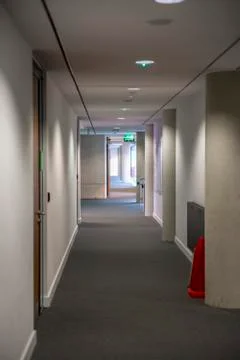 Empty long corridor in a modern office building. 스톡 사진