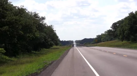Empty long road in the middle of Texas Stock Footage 51051548