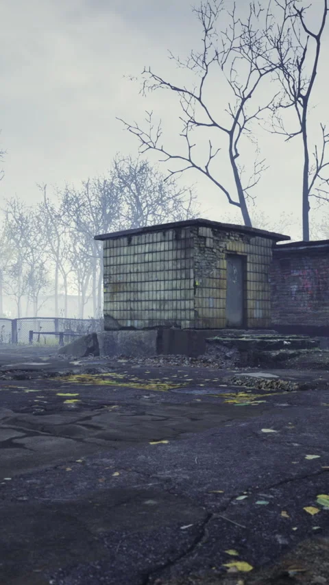 Empty lot featuring weathered utility block and nearby foliage Vídeos de archivo 326350656
