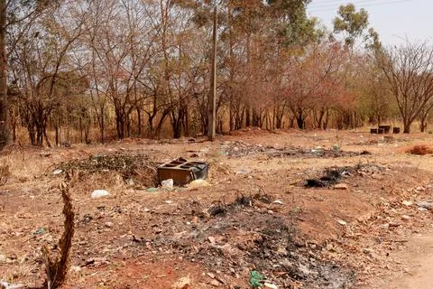 An empty lot that was used to dump trash Stock Photos