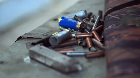 The empty machine gun shells. Close-up. Stock Footage 142463049