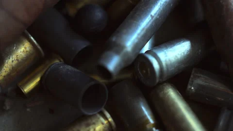 The empty machine gun shells. Stock Footage 142716885