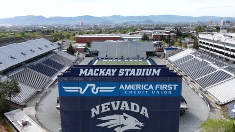 Empty Mackay Stadium at University of Nevada Reno with empty green football 動画素材 335321736