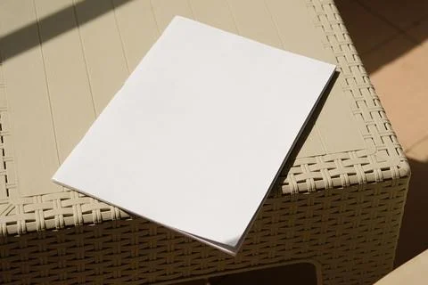 Empty magazine mockup on plastic table tile floor in the room, shadow overlay Stock Photos