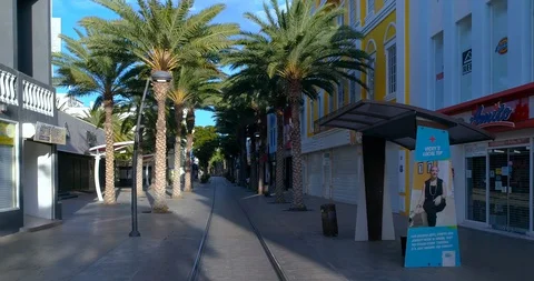 Empty mainstreet due to covid 19, fly in Caribbean island Aruba 2. Stock-Footage 128554489