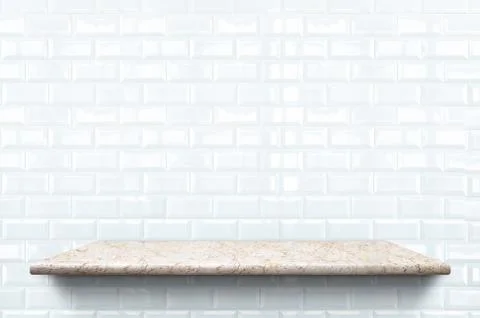 Empty marble shelf at white ceramic tile wall pattern background,Mock up for  Stock Photos
