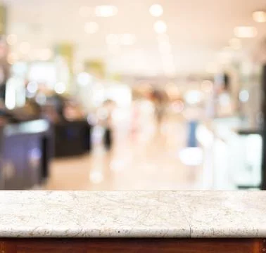 Empty marble table and blurred store in background. product display template Stock Photos