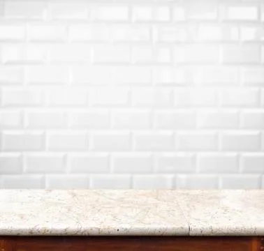 Empty marble table and ceramic tile brick wall in background. product display Foto stock
