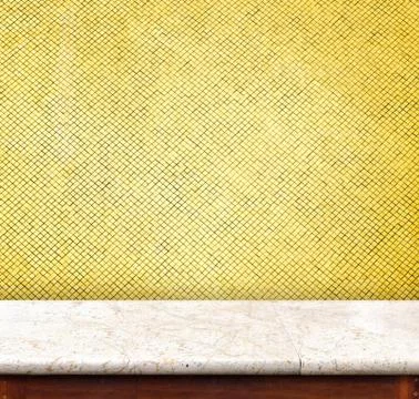 Empty marble Table top at golden mosaic tiles wall,Template mock up for displ Stock Photos