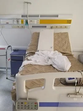 Empty medical bed Stock Photos