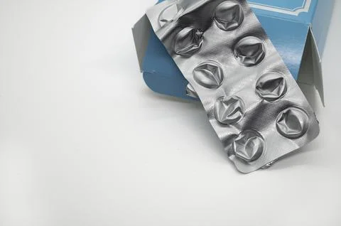 Empty medicine package on a white background Stock Photos