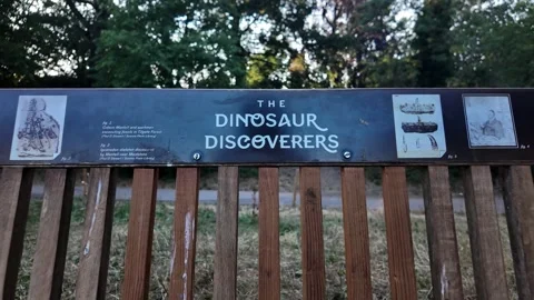An empty memorial bench dedicated to 'The Dinosaur Discoverers' in Crystal Stock Footage 341370084