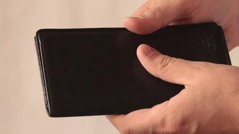 Empty men's purse Stock Footage 98313276