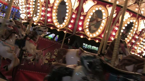 Empty Merry-Go-Round Horses at Night Stock Footage 34927225