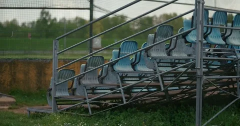 Empty metal bleachers with plastic seats Stock Footage 332948652