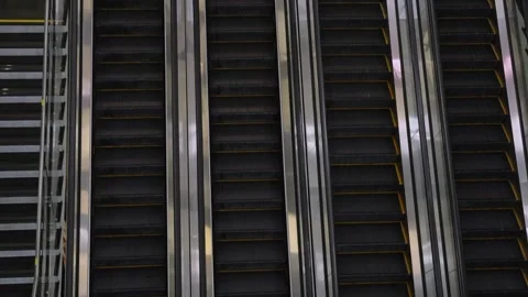 Empty metal escalators in shopping mall 動画素材 335950374