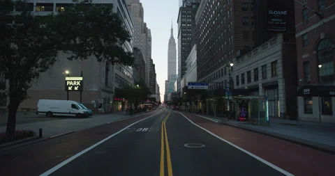 Empty midtown Manhattan 34th st. with Empire State Building sunrise Stock Footage 218121829