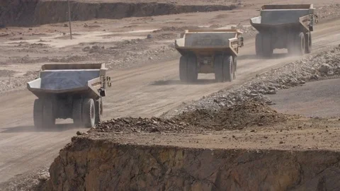 Empty mine dump trucks Stock Footage 81732951