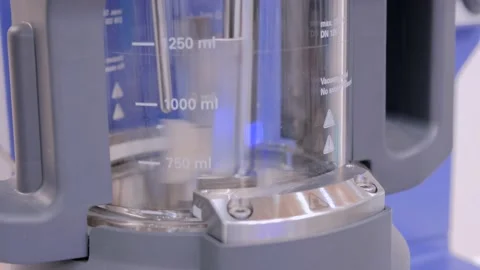 Empty mixer stirrer with fast moving parts for mixing liquid - lab equipment Stock Footage 153467795