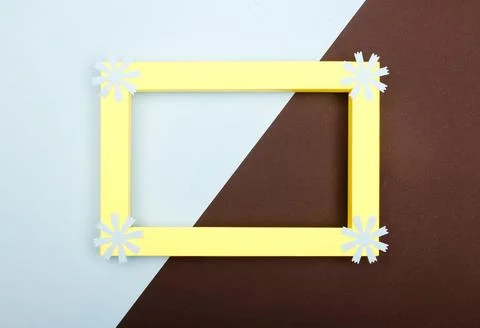Empty mockup frame with crafting paper flowers isolated on paper background Stock Photos